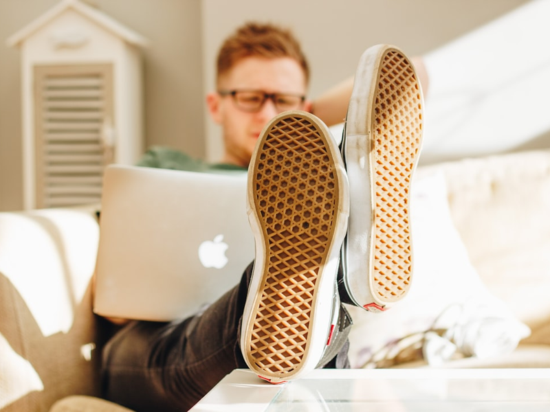 A young adult working from home