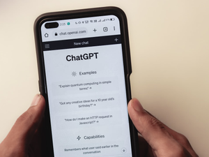 Webpage of ChatGPT, a prototype AI chatbot, is seen on the website of OpenAI, on a smartphone. Examples, capabilities, and limitations are shown in that picture.
