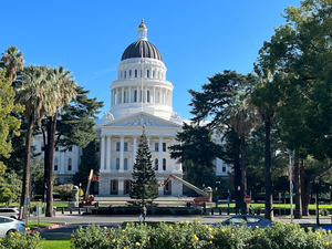 a large white building with a dome on top of it