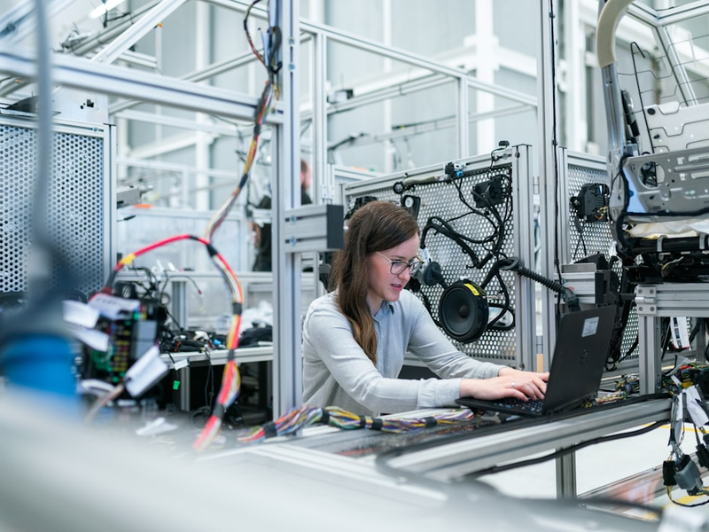 Female electronics engineer runs vehicle tests
