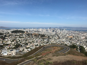 city buildings under blue sky during daytime