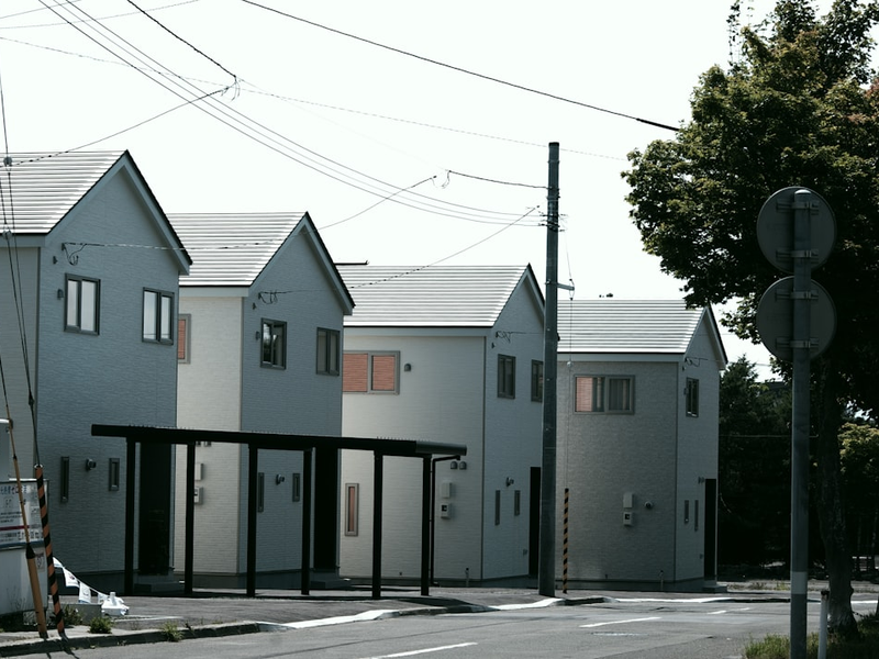 white and gray concrete house