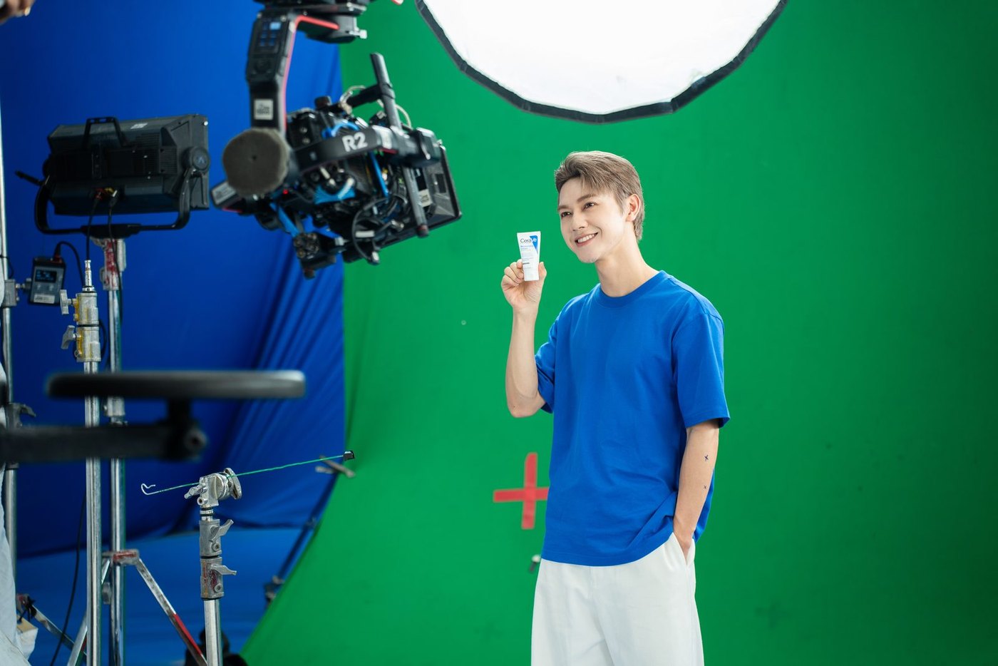 Performer filmed against a green screen with a cinema camera on a CeraVe shoot