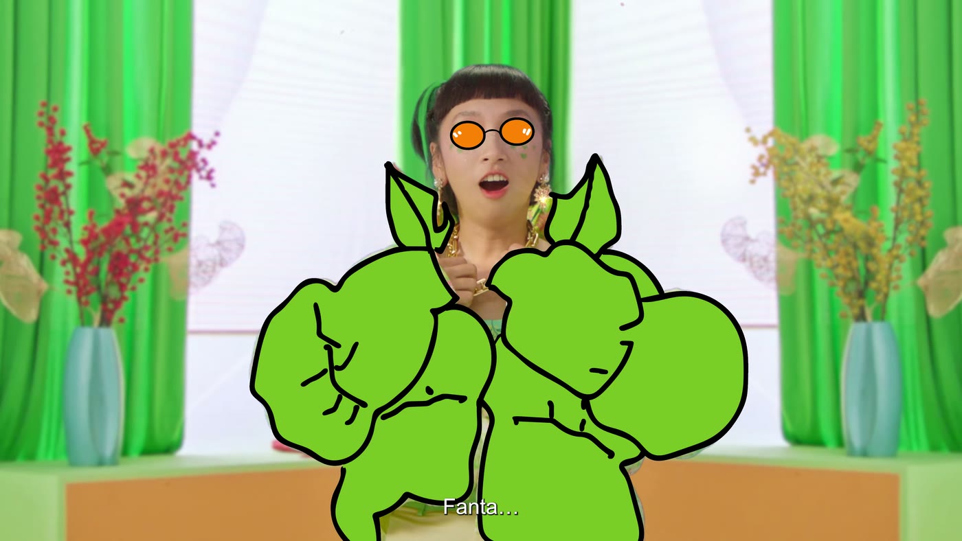 Live action with a hand-drawn animation drawn over a performer in a bright Tết living room, from a Fanta commercial