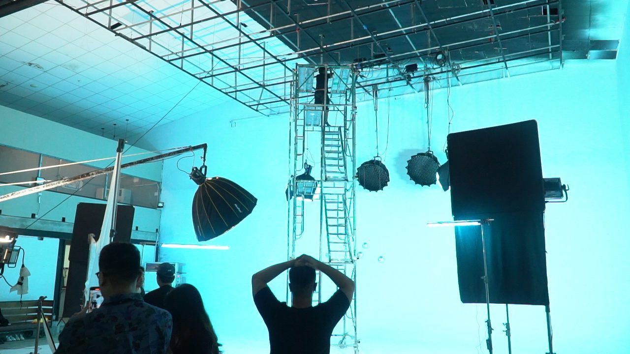 Saigon Chill × B Ray, cyan cyc, lights hung
