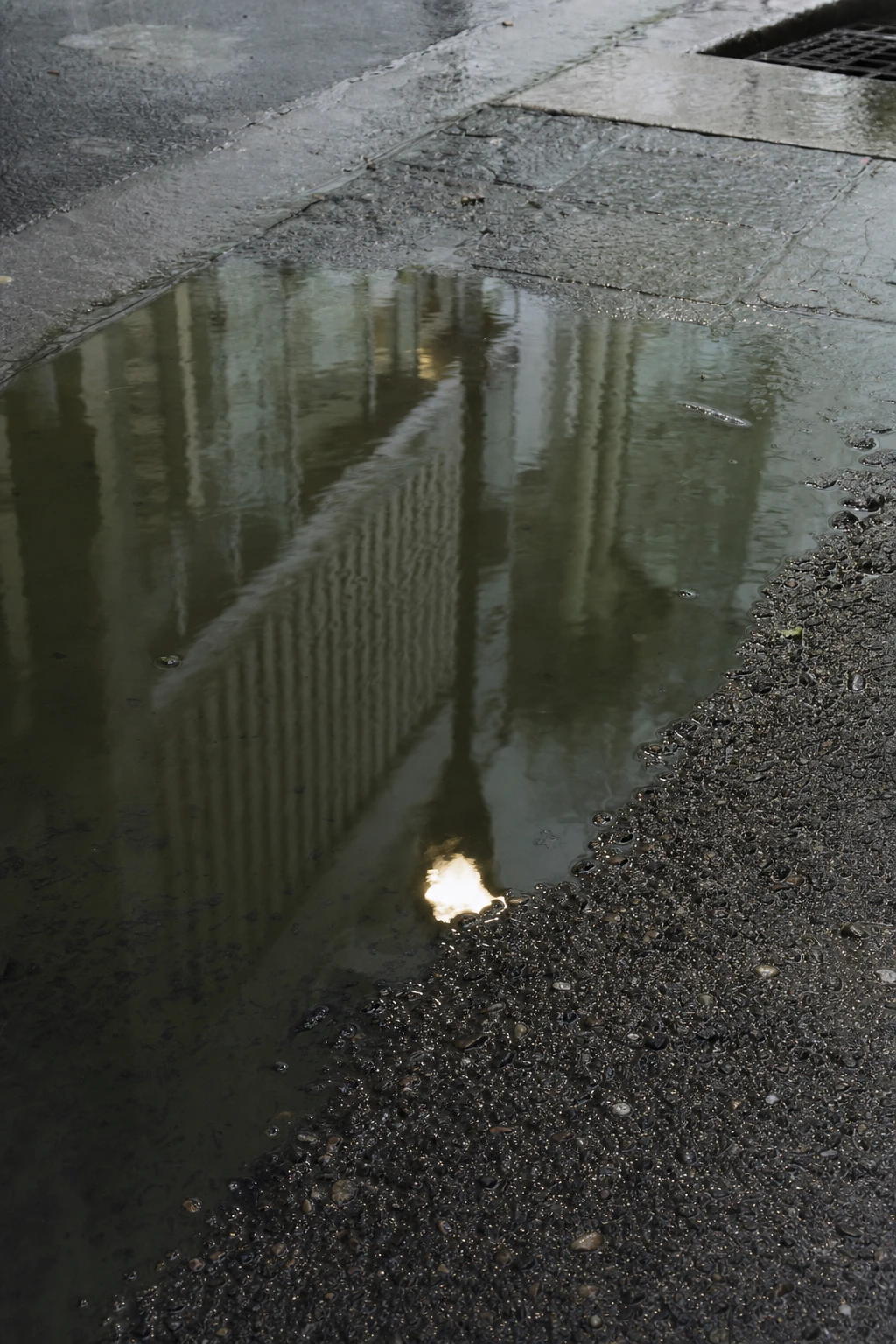 Ahead is less a point on the map and more a pattern in the rain, reflecting what we choose to see and what we leave blurred in the distance.