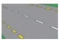 The edge of the carriageway or hard shoulder.