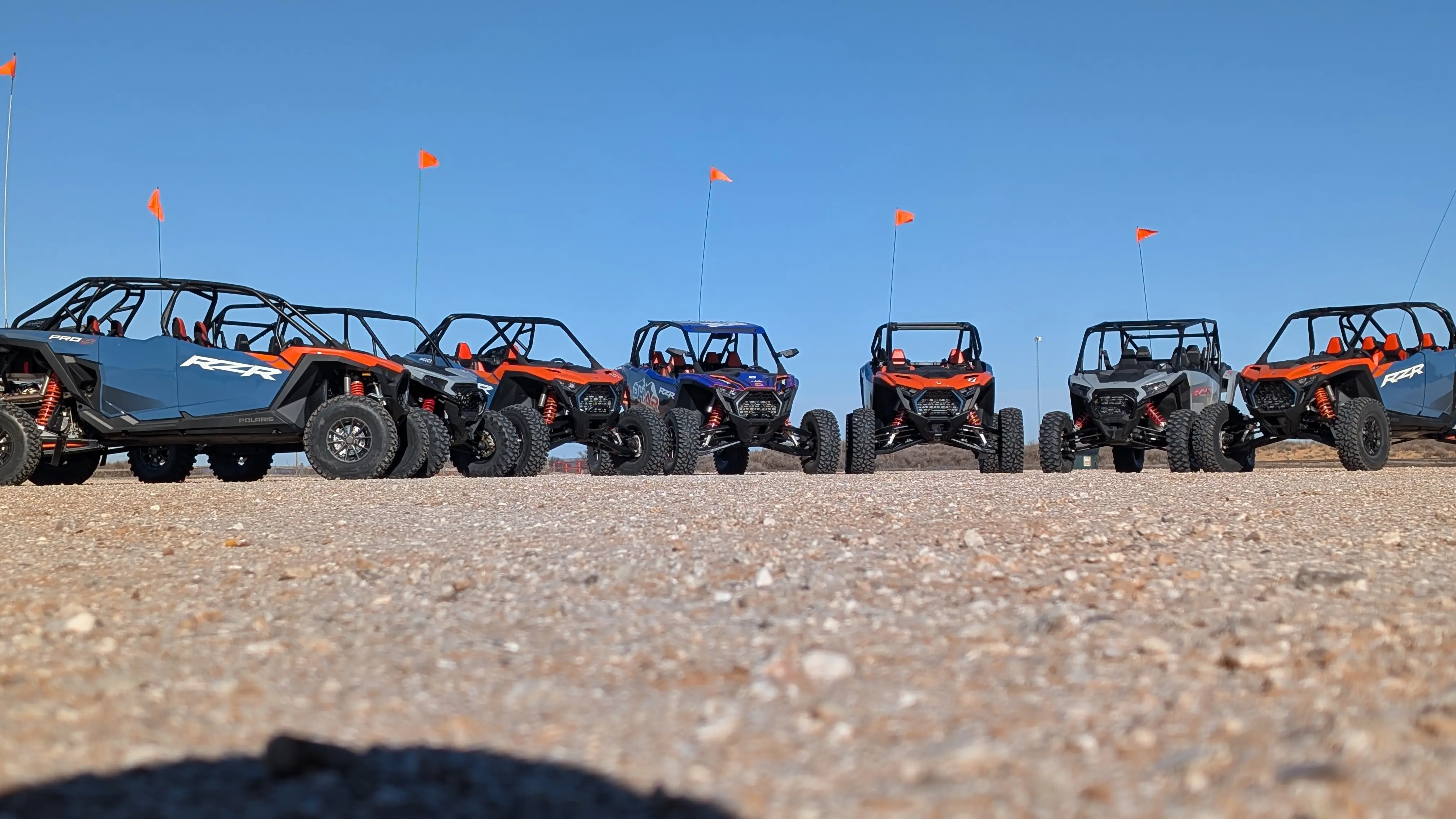 Fleet of Polaris RZR XP 1000 and Pro S side-by-sides lined up for guided dune tours at Little Sahara State Park in Waynoka, OK.
