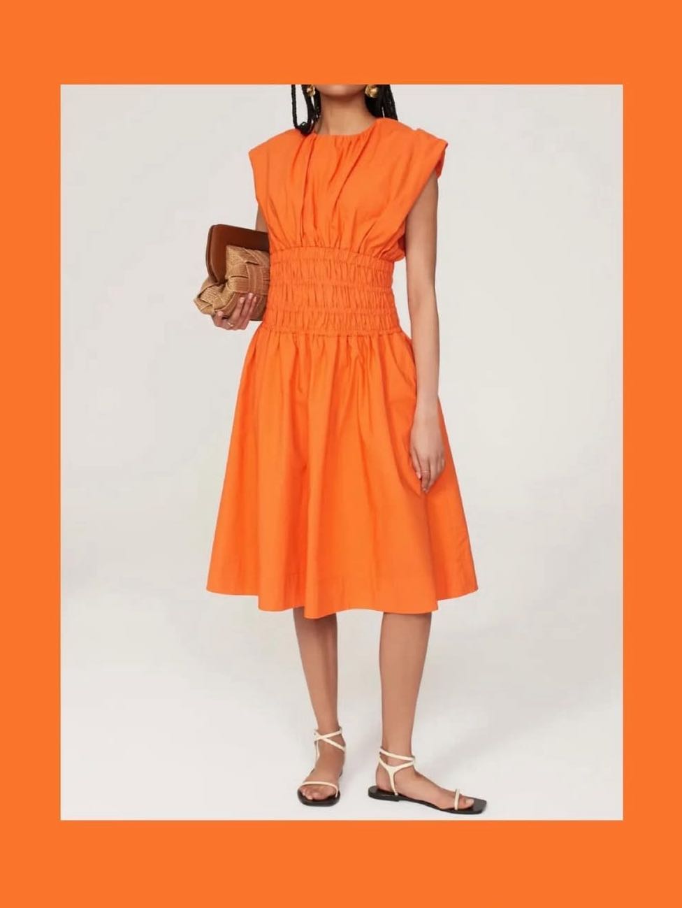 Orange smocked midi dress
