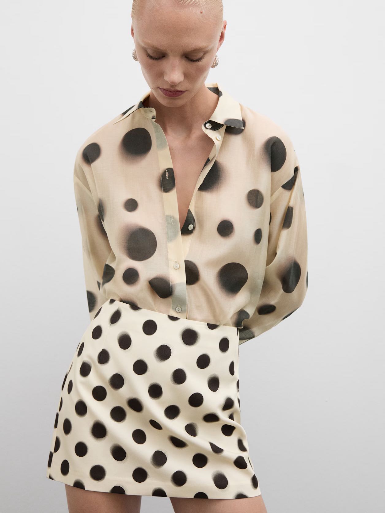 Polka dot satin mini skirt and lyocell shirt