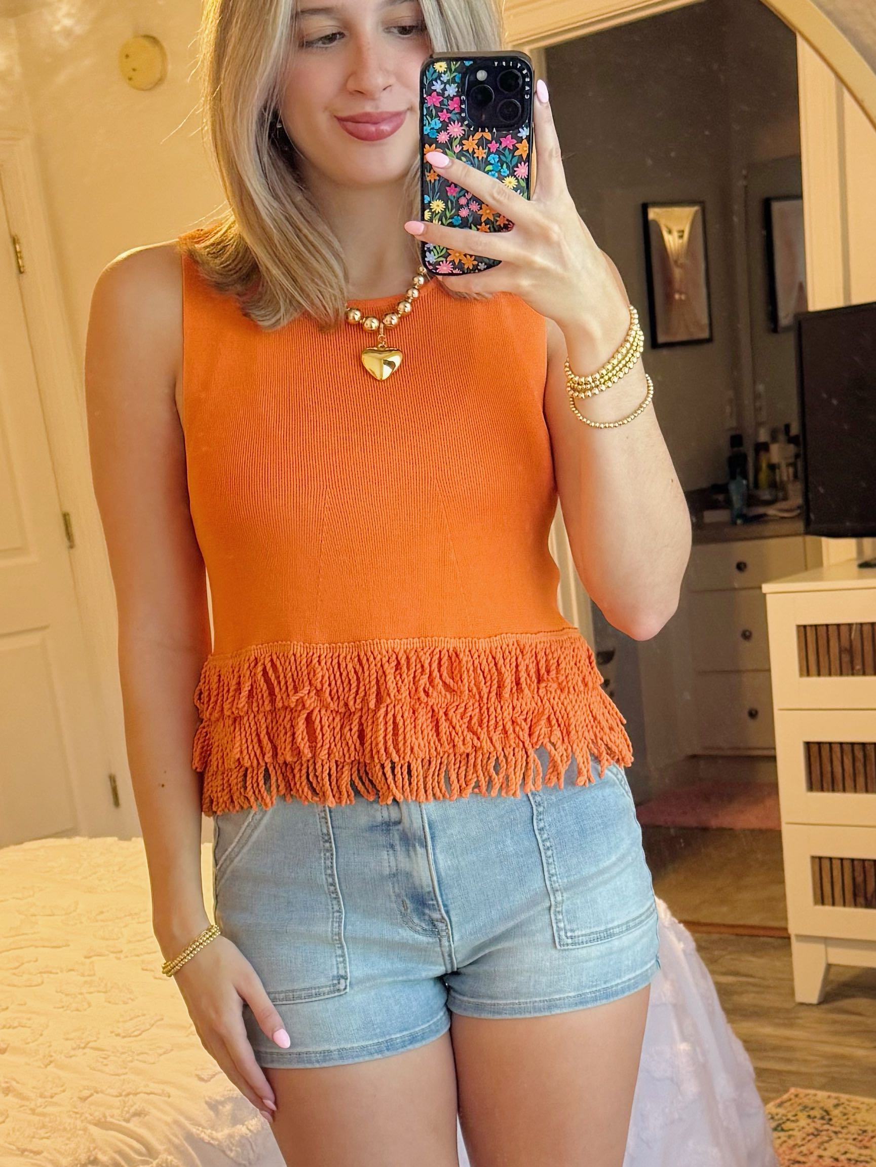 Orange pants store top