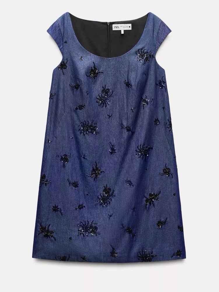 Mini blue denim dress with embellishments