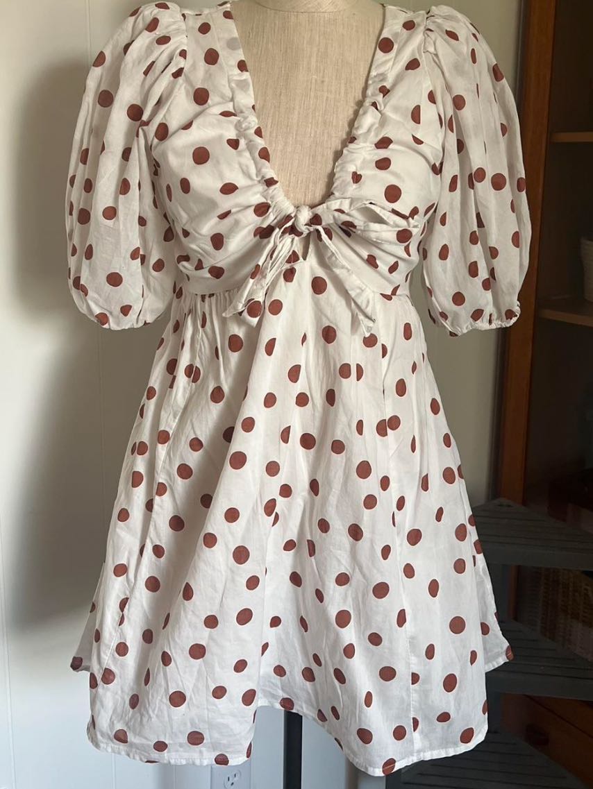 White dress with brown polka dots
