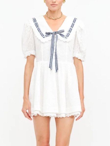 White collared dress with blue ribbon