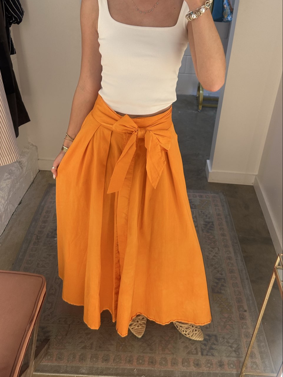 Orange button down skirt and tie back top