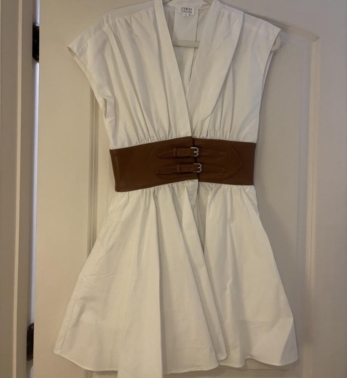 Coco Lily’s white dress with leather brown belt