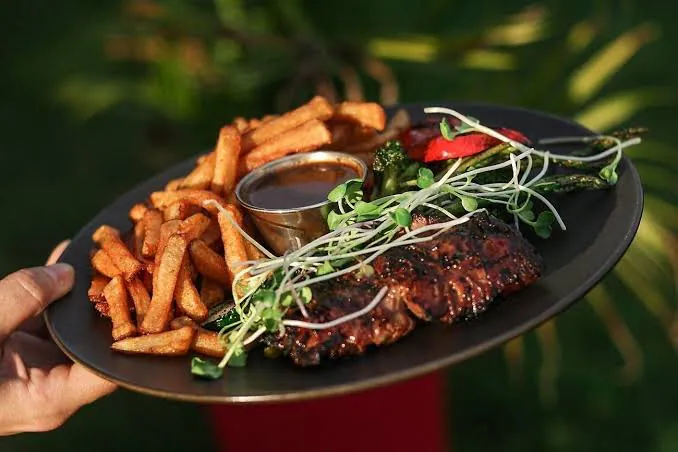 Kids eat free — one child 10 or under per adult at Restaurant Rouge Steakhouse