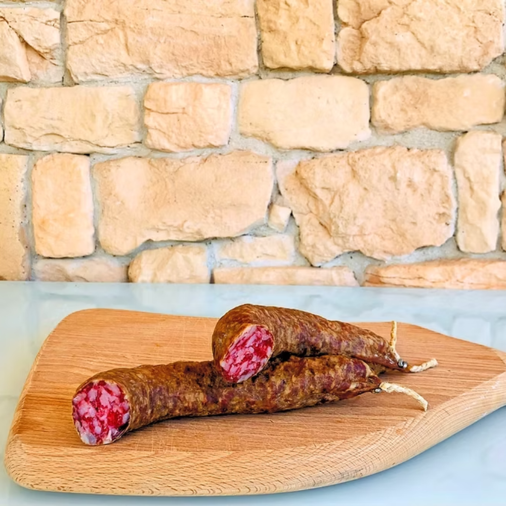 Cesto di Natale "Norcino" - 7 Pezzi (Salamella di Suino Nero, Guanciale Stagionato, Pancetta Tesa di Suino Stagionata, Salamini Stagionati al Tartufo Nero, Salamini Stagionati al Pepe, Salsiccette Stagionate al Finocchio, Coppiette Stagionate di Prosciutto)