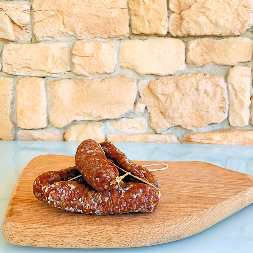 Cesto di Natale "Gourmet" - 10 Pezzi (Caciotta di Capra Semi Stagionata al Pistacchio Verde di Bronte, Caciotta di Capra Semi Stagionata al Rosmarino, Caciotta di Capra semi Stagionata Affinata in Grotta, Stracchinato di Capra a Crosta Fiorita "Tipo Brie", Salamini Stagionati di Suino Nero, Guanciale Stagionato di Suino Nero, Salamini Stagionati al Tartufo Nero, Miele Bio di Acacia, Confettura Extra alle Amarene, Crema 100% di Nocciole Gentile Romana e Cacao Naturale)