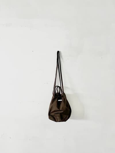 【美品】R&D.M.Co-　OLDMAN’S TAILOR　ドローストリングバッグ 画像1