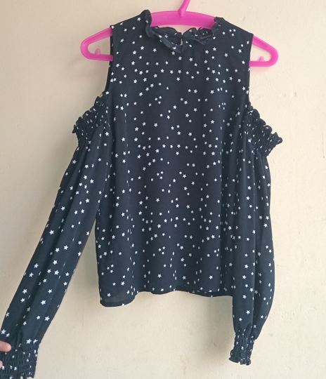 Another view of Black star print cold shoulder top