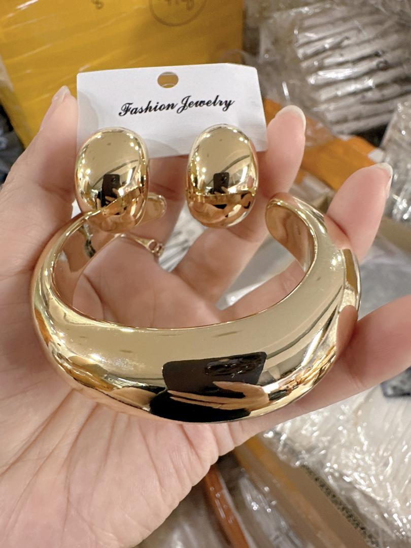 Another view of Steel Bangle and earring
