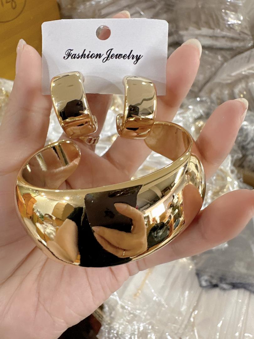 Another view of Steel Bangle and earring