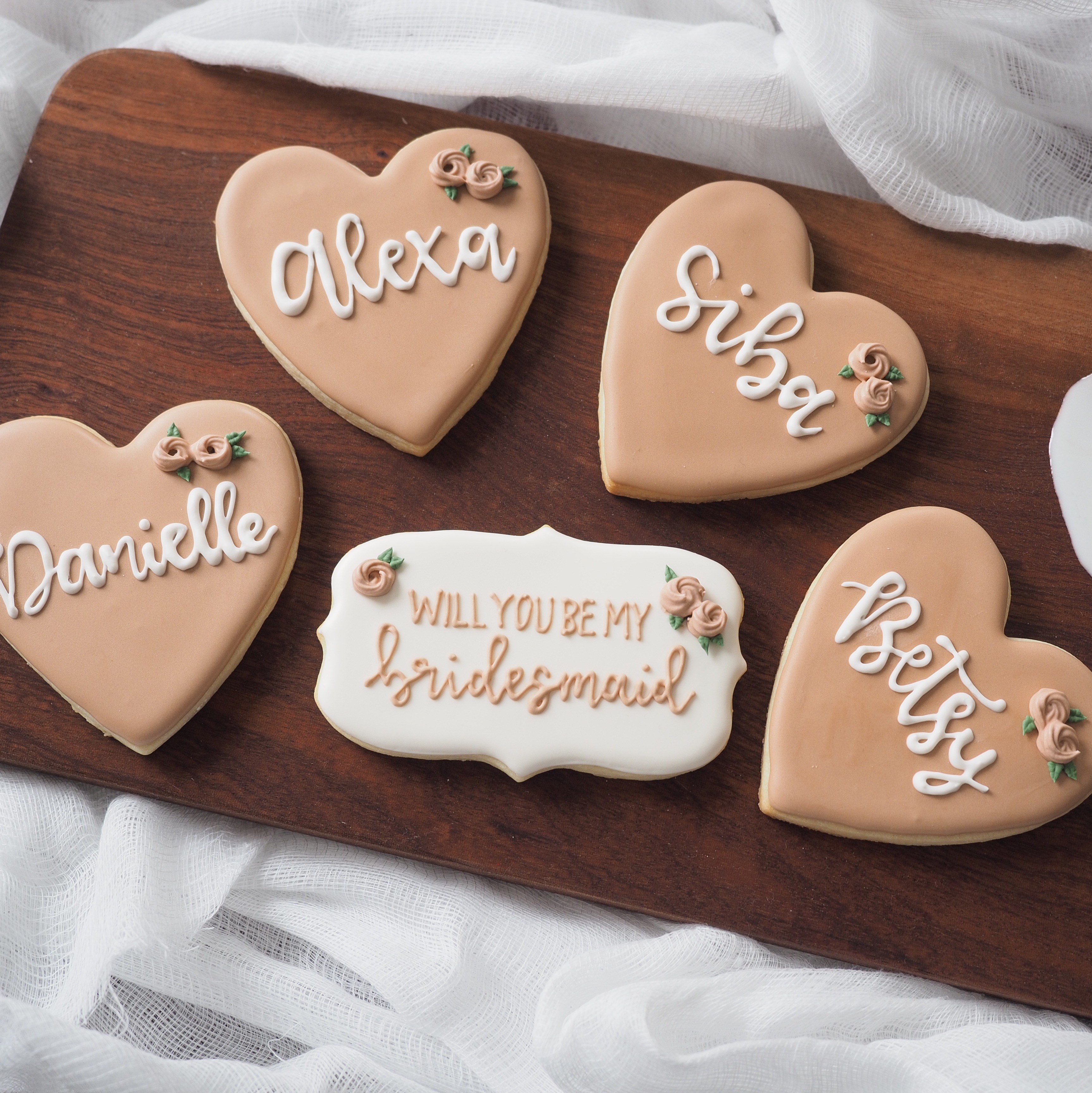 Heart shaped bridesmaid themed sugar cookies