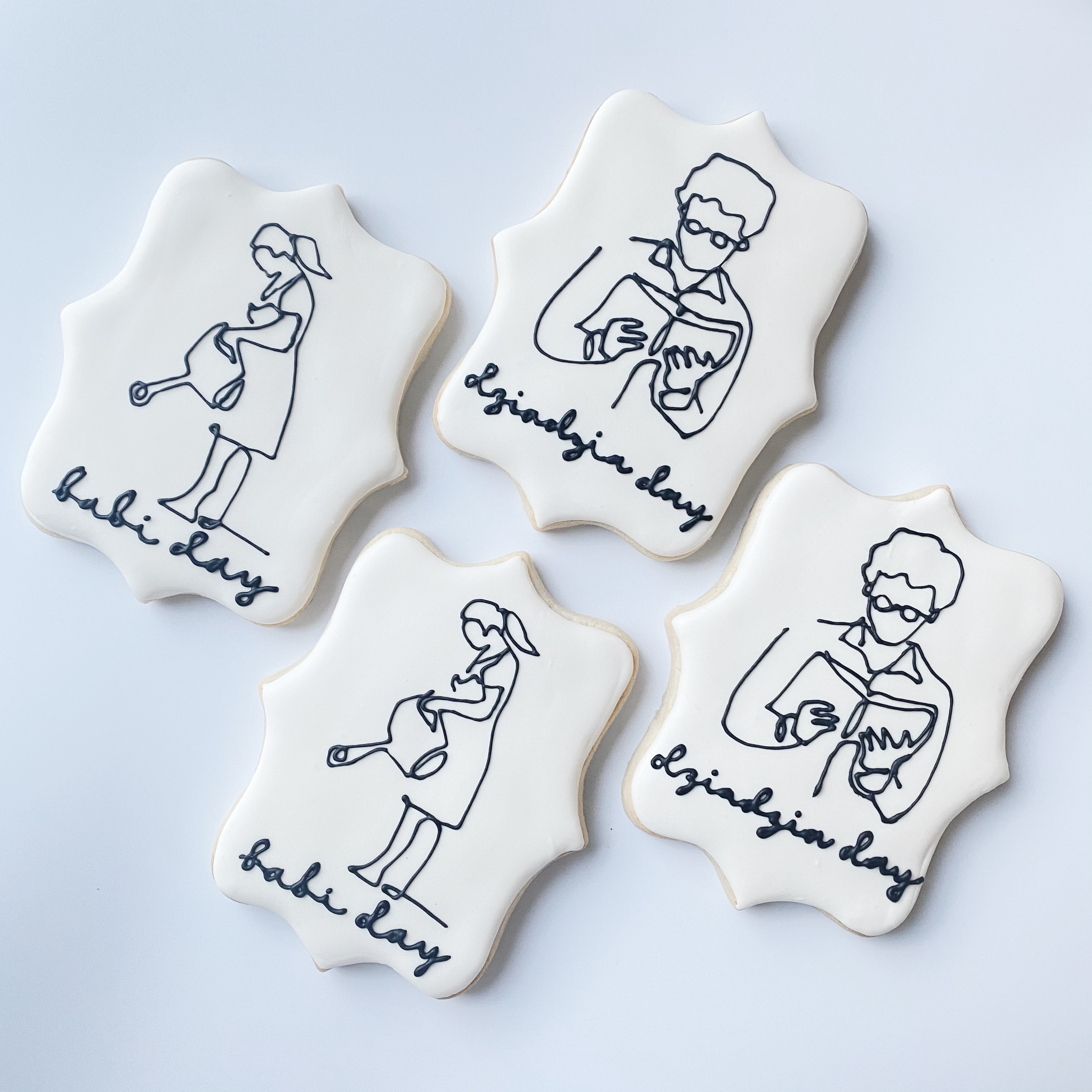 Line art decorated sugar cookies