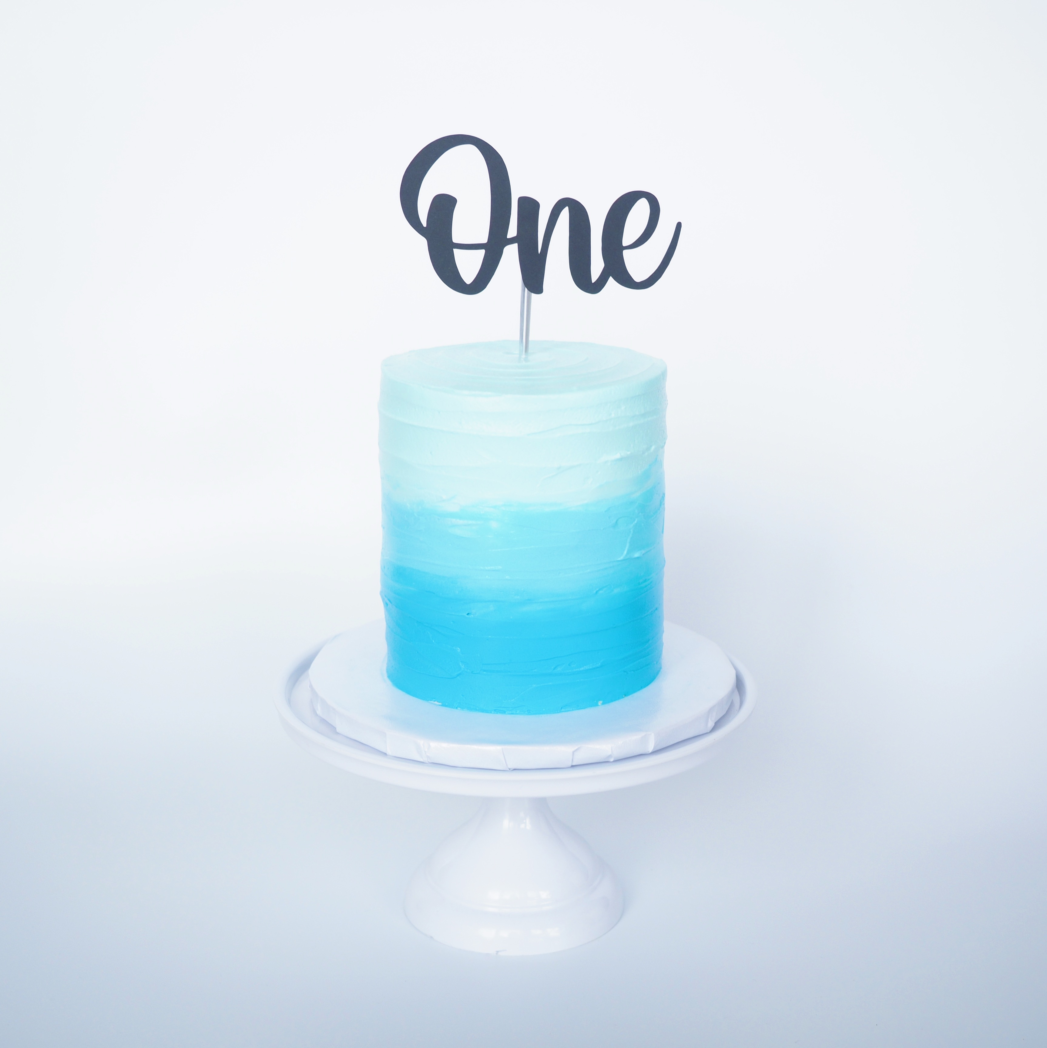 Blue ombre smash cake with cake topper