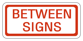 Between Signs Plaque