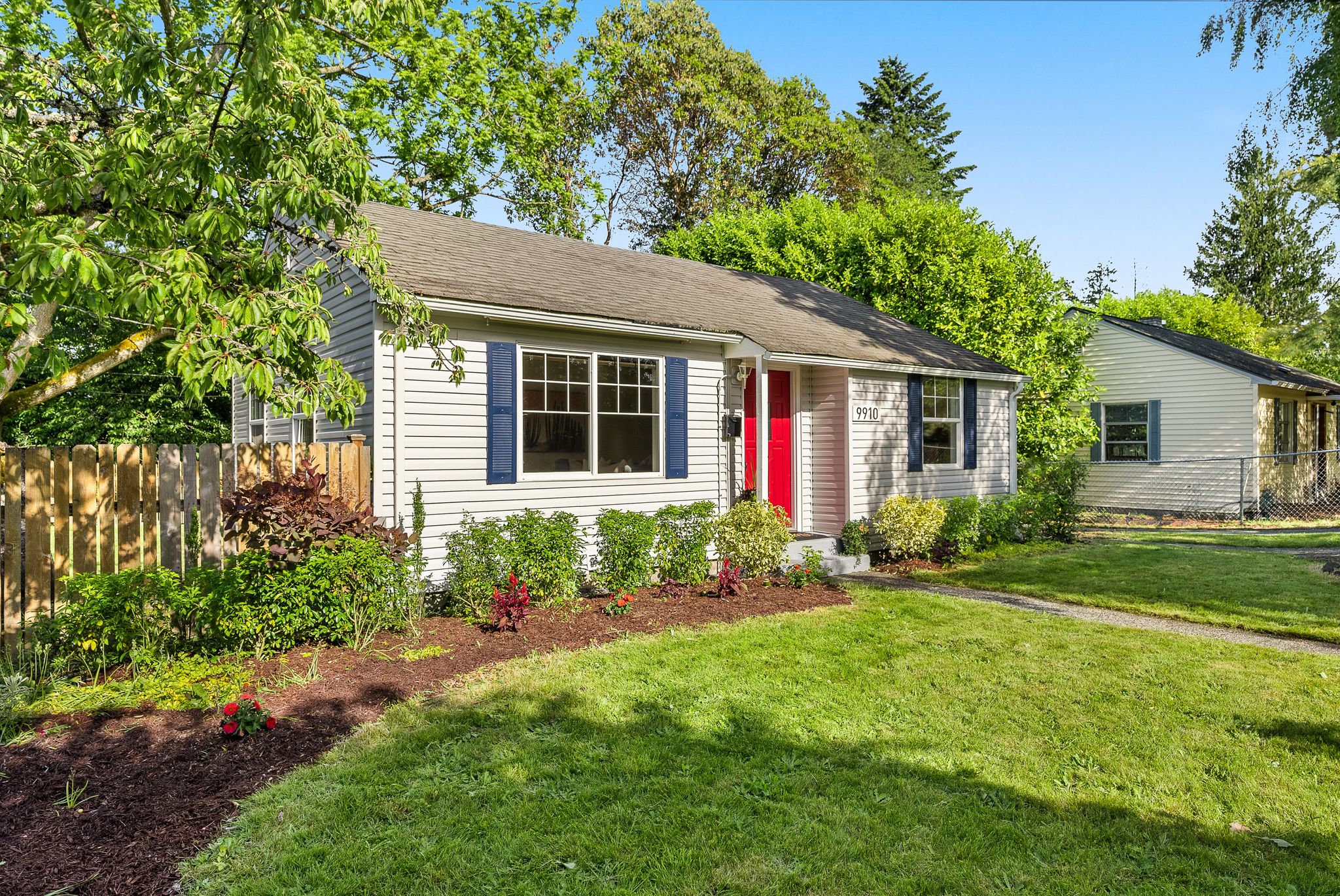 Walk up to the front door via the private garden up front with an apple tree!