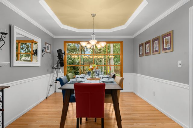 Dining Room features real hardwood floors and Buchan signature window.