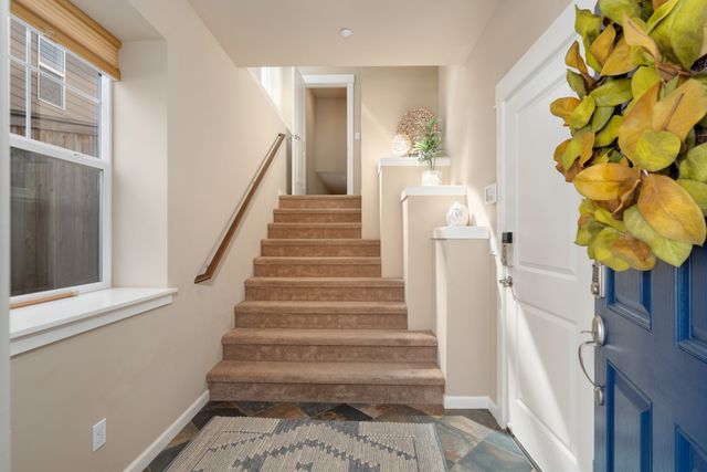 Garage entry just to the right.  Stairs lead to open concept living