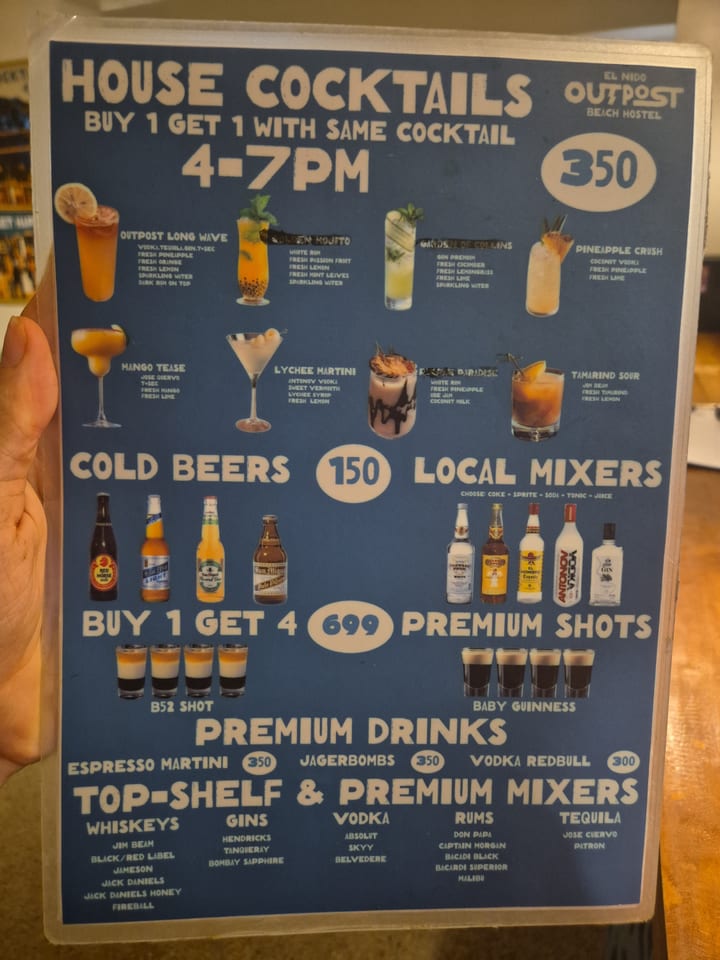 Photograph of the menu at Outpost Beach Hostel