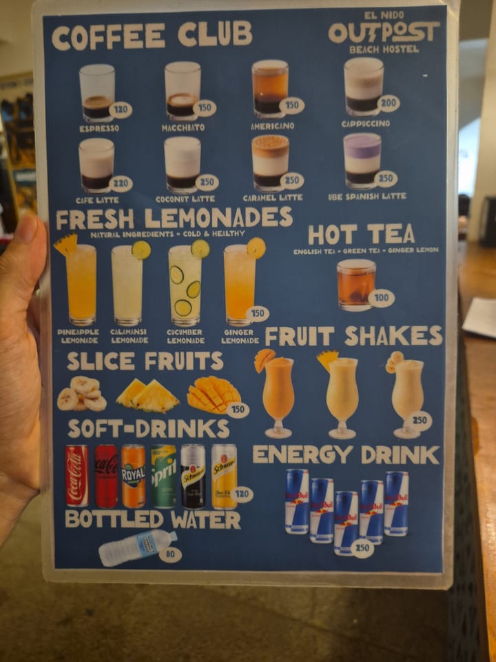 Photograph of the menu at Outpost Beach Hostel