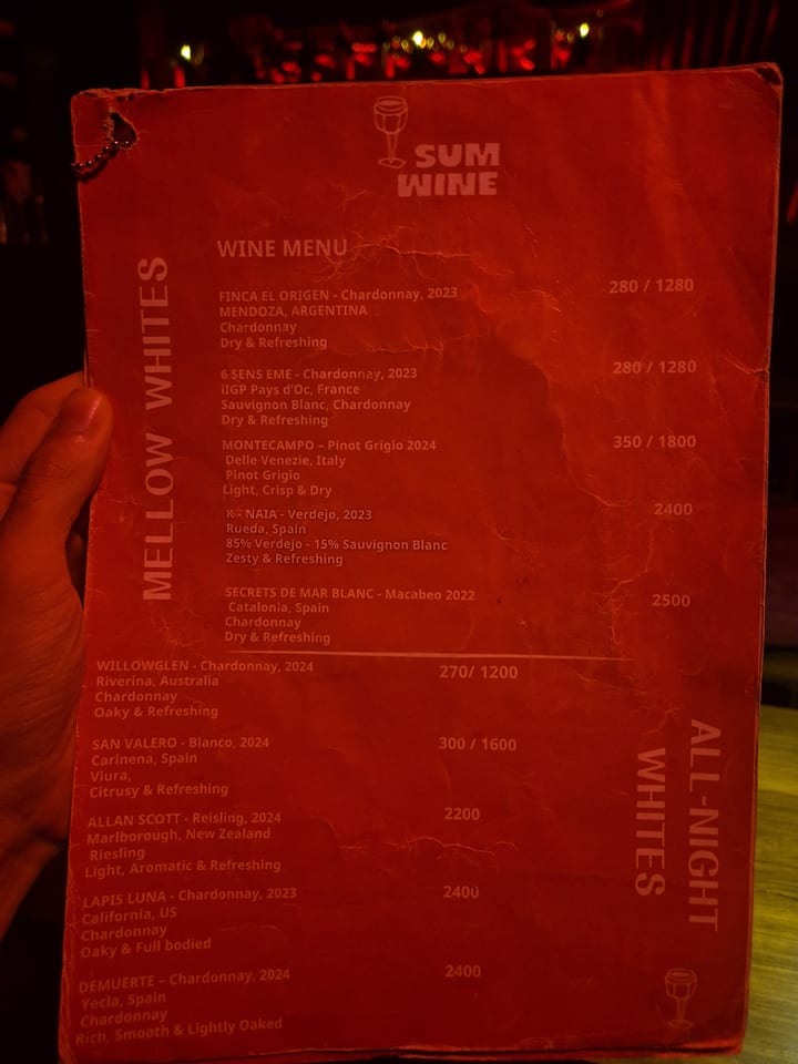 Photograph of the menu at Sum Wine