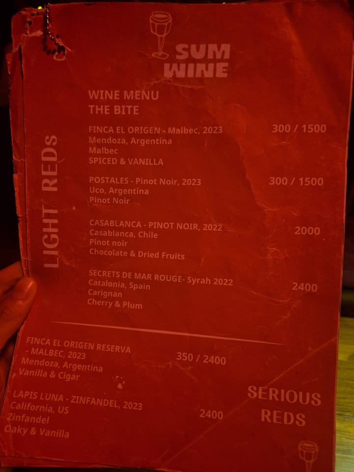 Photograph of the menu at Sum Wine