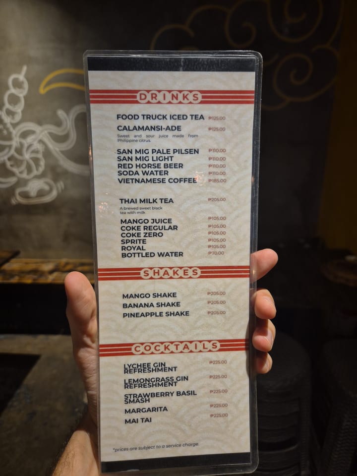 Photograph of the menu at Th food truck