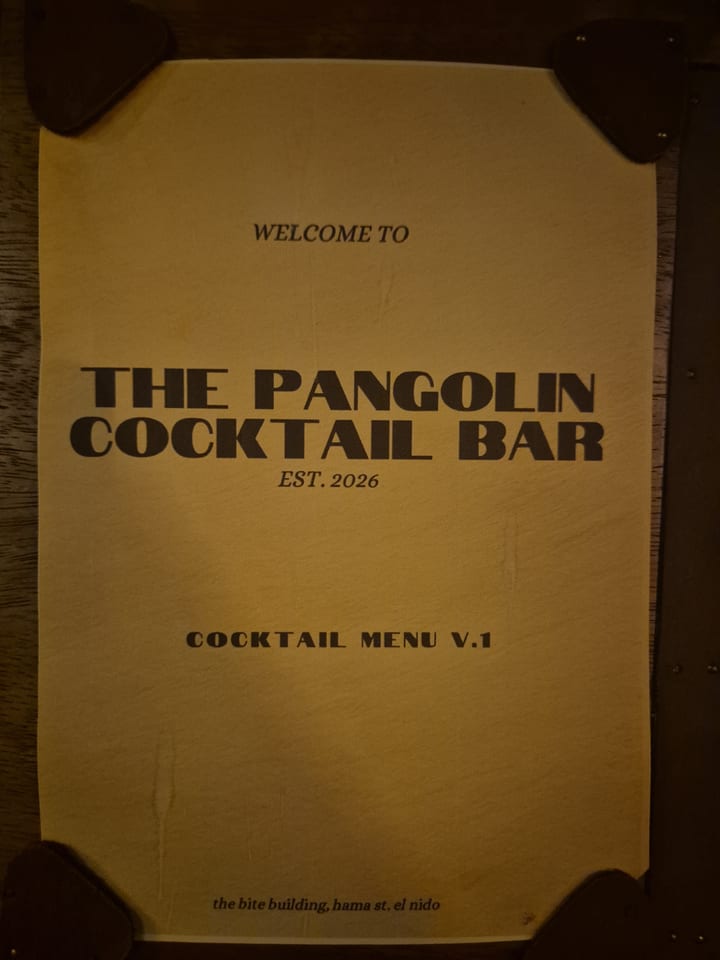 Photograph of the menu at The Pangolin - Cocktail Bar
