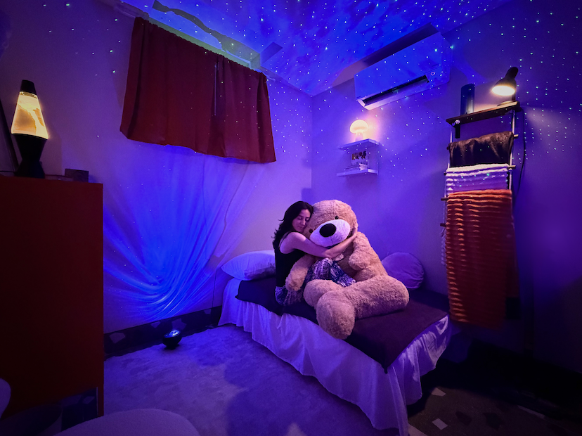 Melissa cuddler hugging a bear