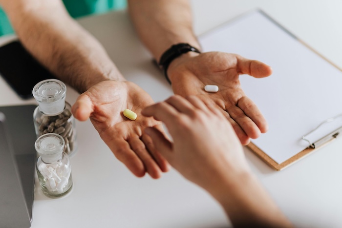 Pills on hands