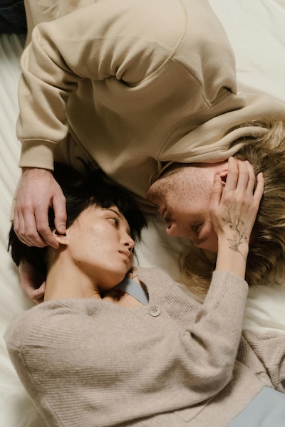 Two people embracing each other cuddling