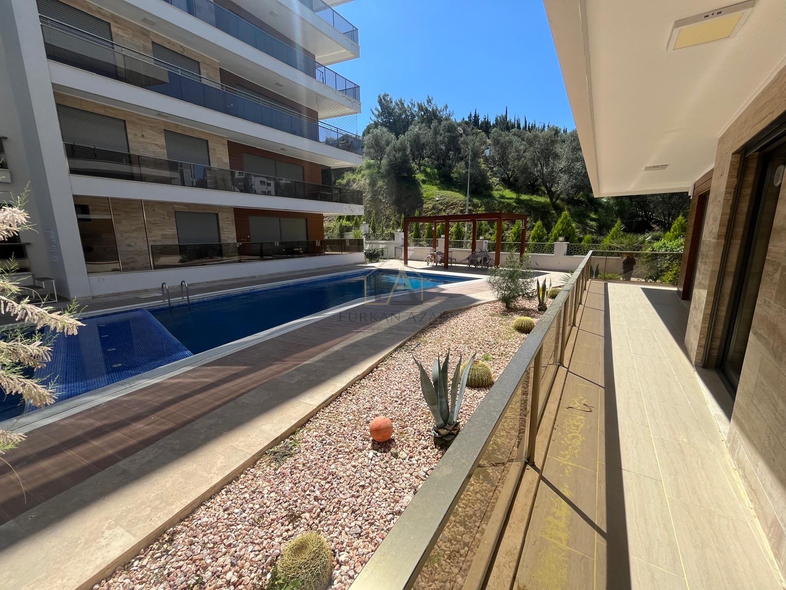 GAZİEMİR’DE MUHTEŞEM 3+1 HAVUZLU DOĞA İLE İÇ İÇE DAİRE