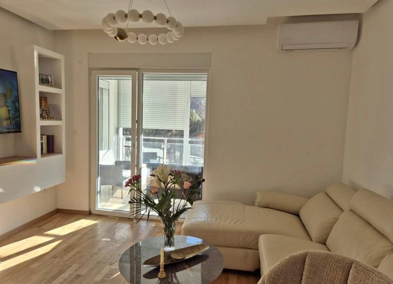 One Bedroom New Apartment with Side Sea View in Becici 