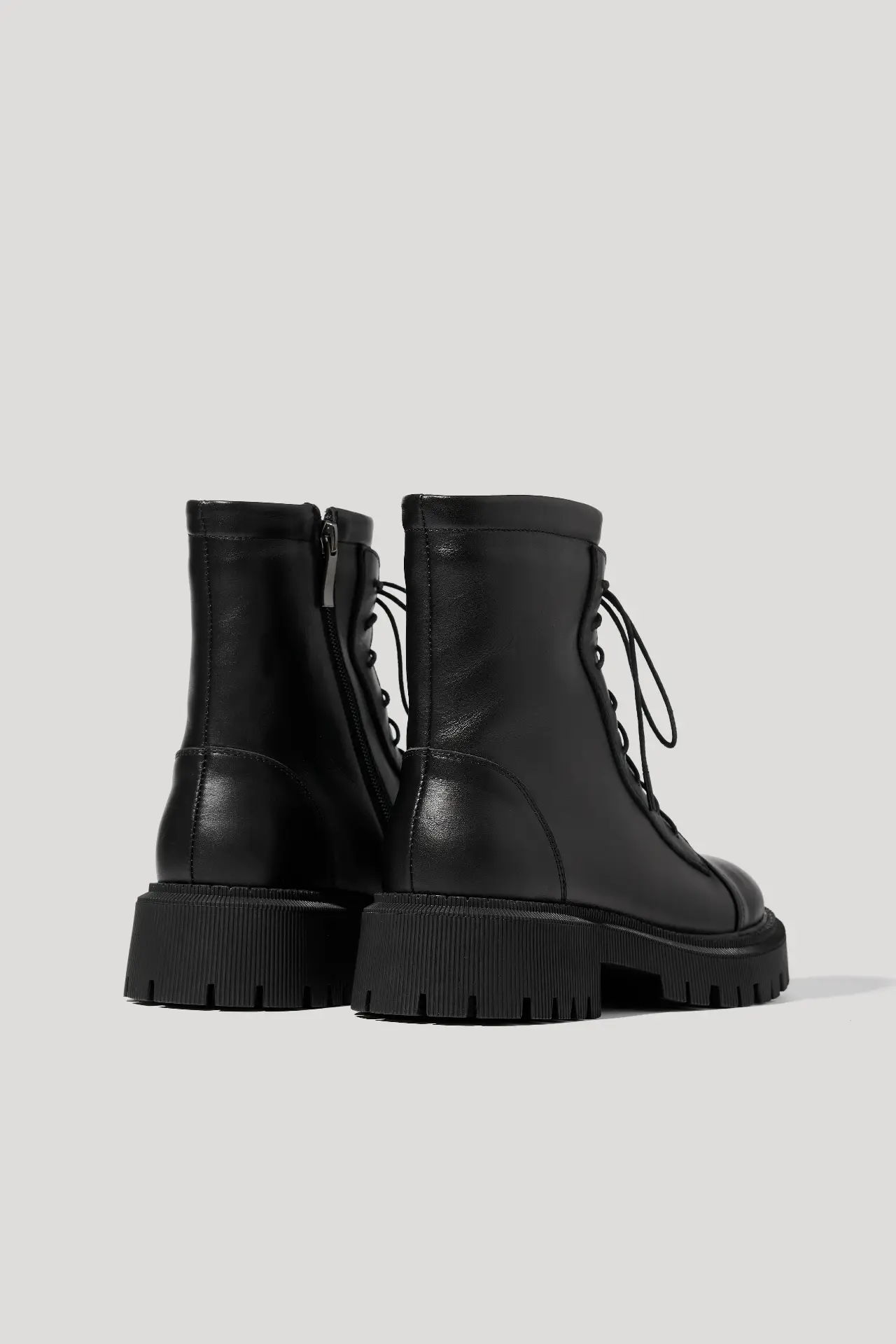 Черевики чорні шкіряні із замком збоку та шнурками, з набивним хутром