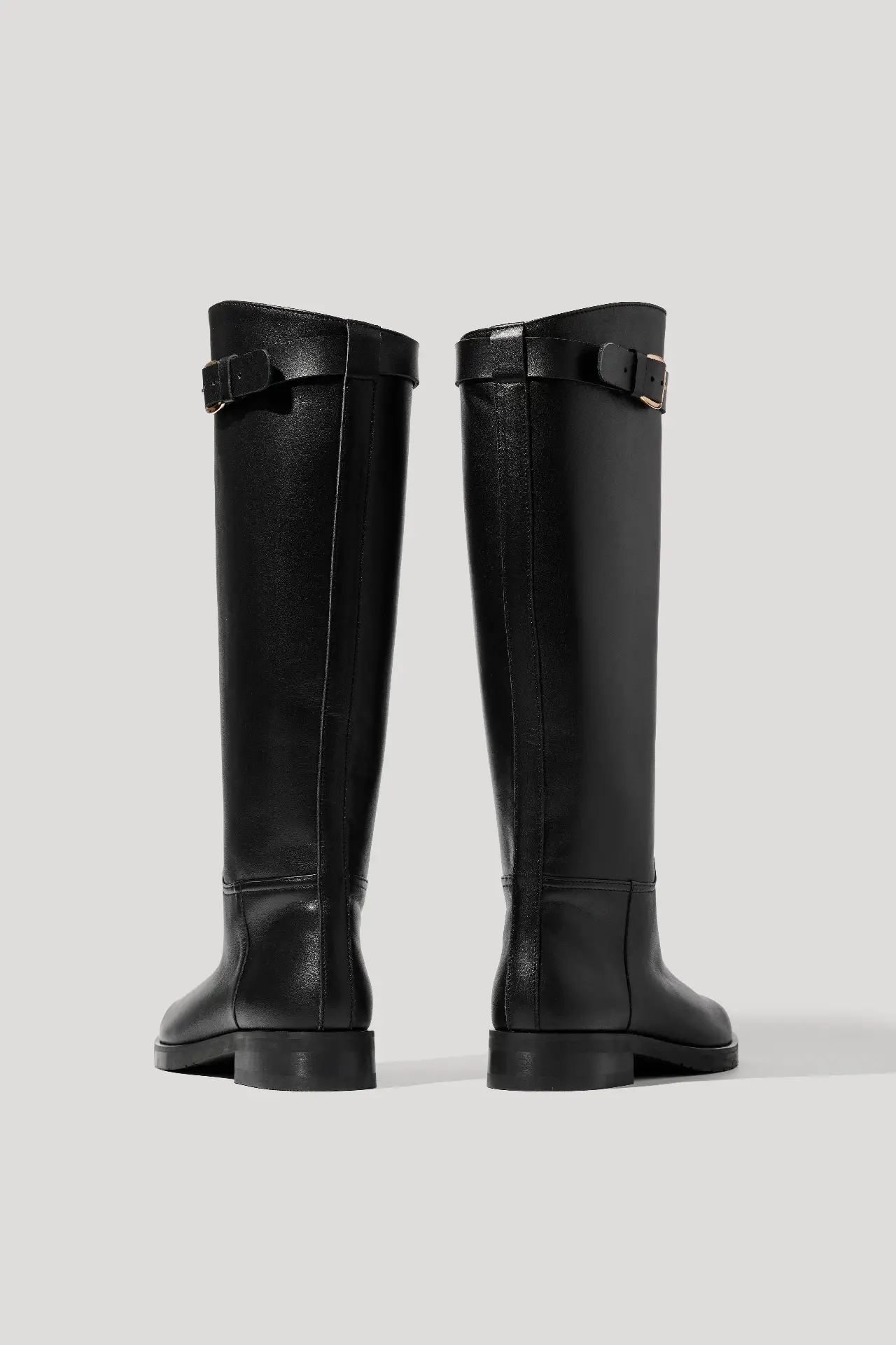 Чоботи в жокейському стилі чорні шкіряні з набивним хутром