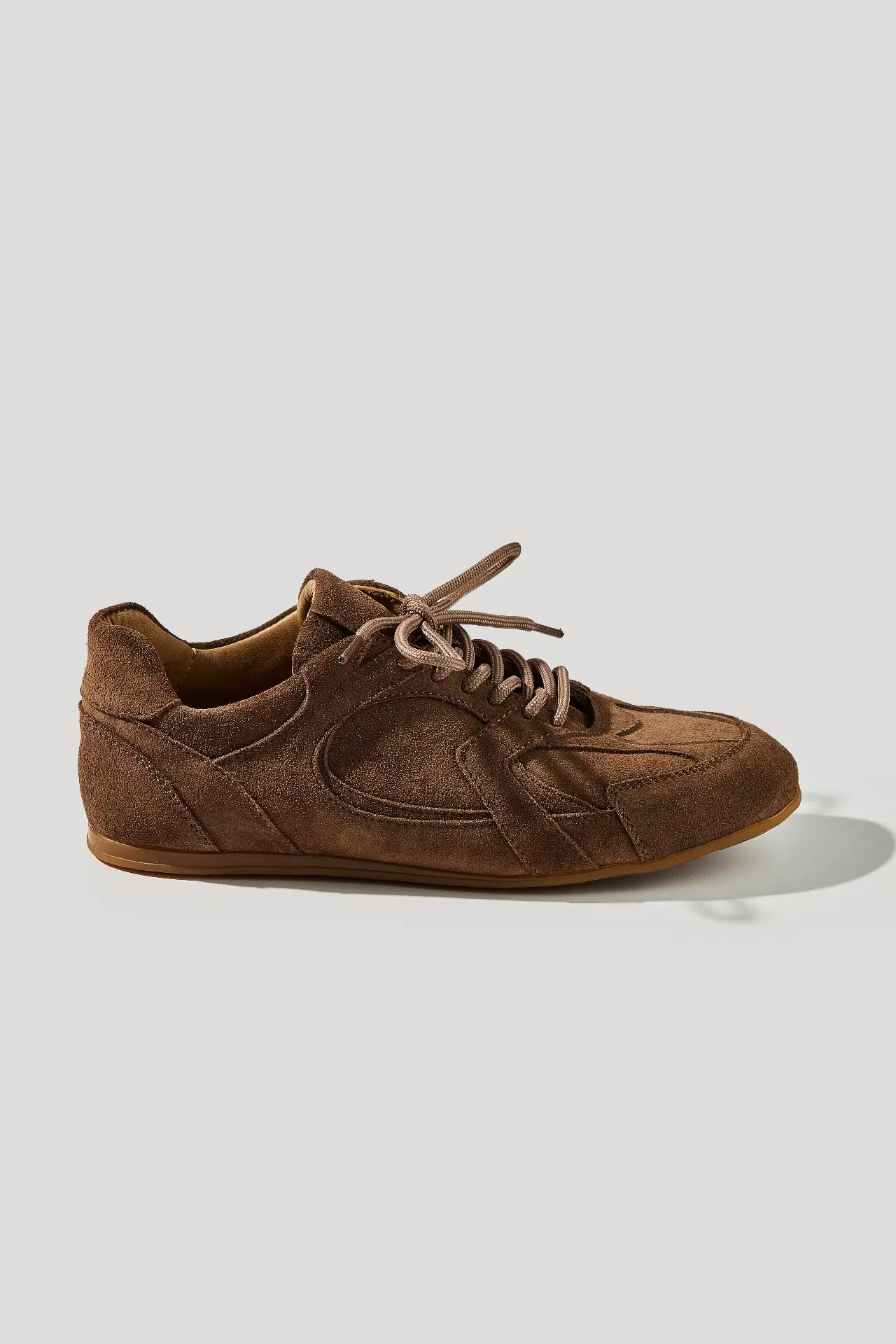 Peat-colored suede low-top sneakers