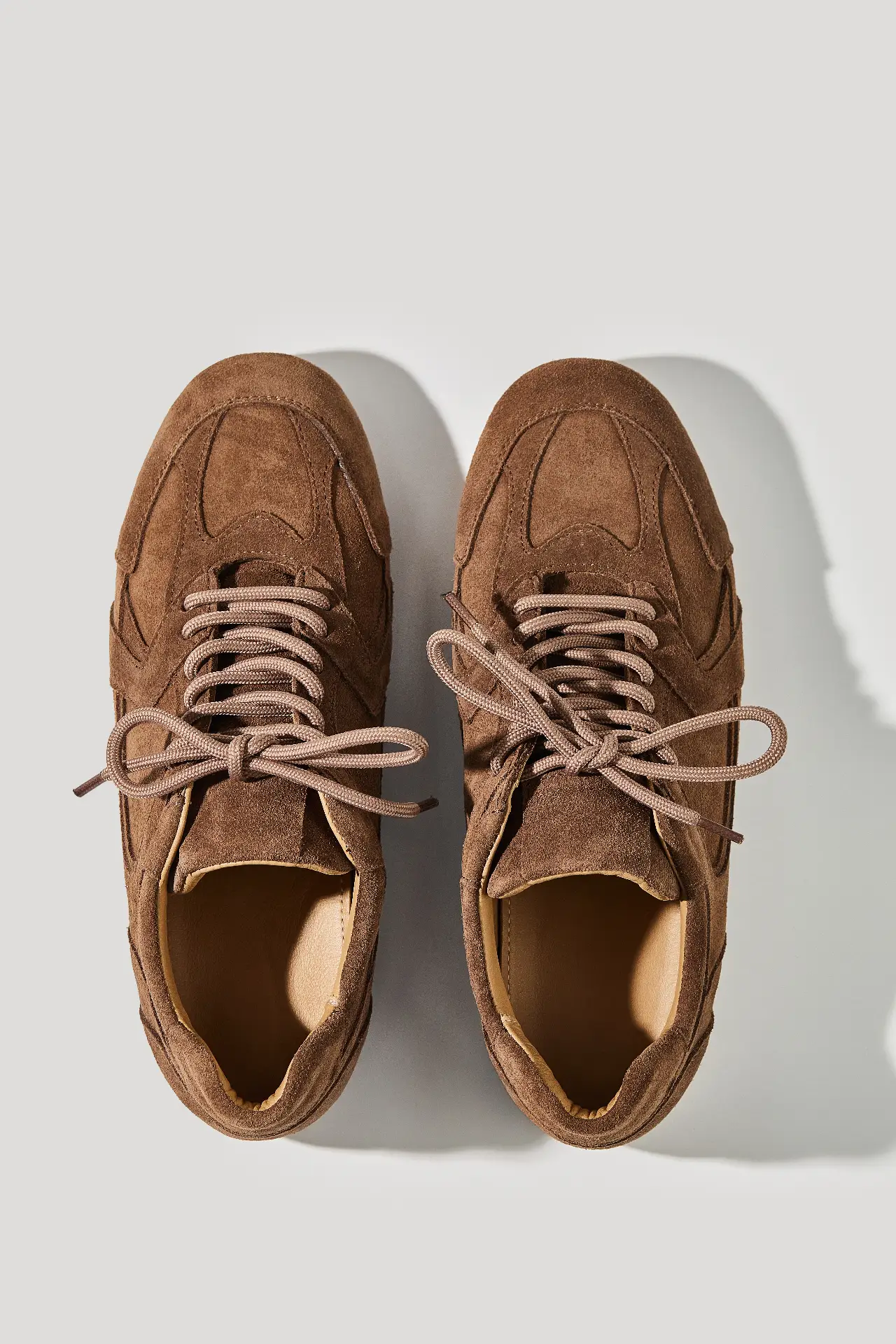Peat-colored suede low-top sneakers