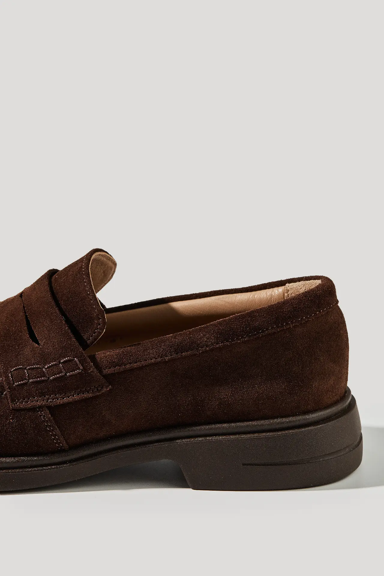 Chocolate suede loafers with a round toe